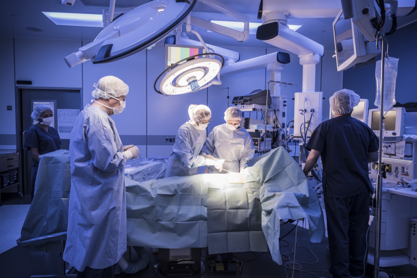 Surgeons at work in an operating room